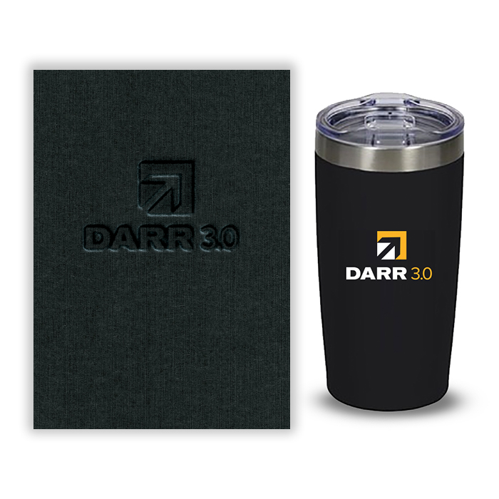 Promotional items include cup and notebook