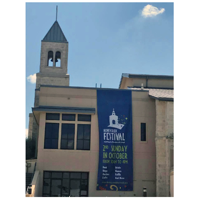 Large banner on the side of a church